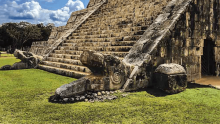 Two of the 8 Kukulkan stone heads at The Castle stair case at Chichen Itza, Yucatan.